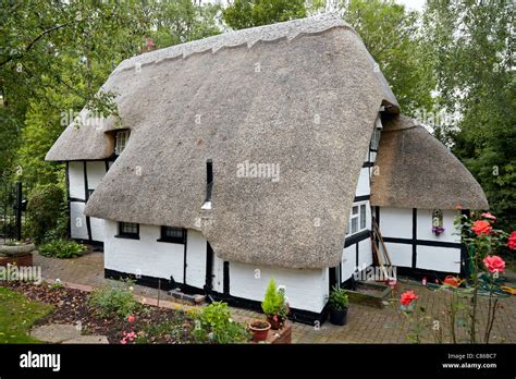 tudor style house uk|tudor house with thatched roof.